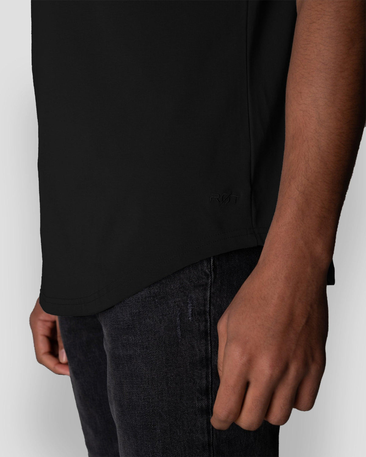 Origin Curved Henley fit and silhouette detail, shown in Black
