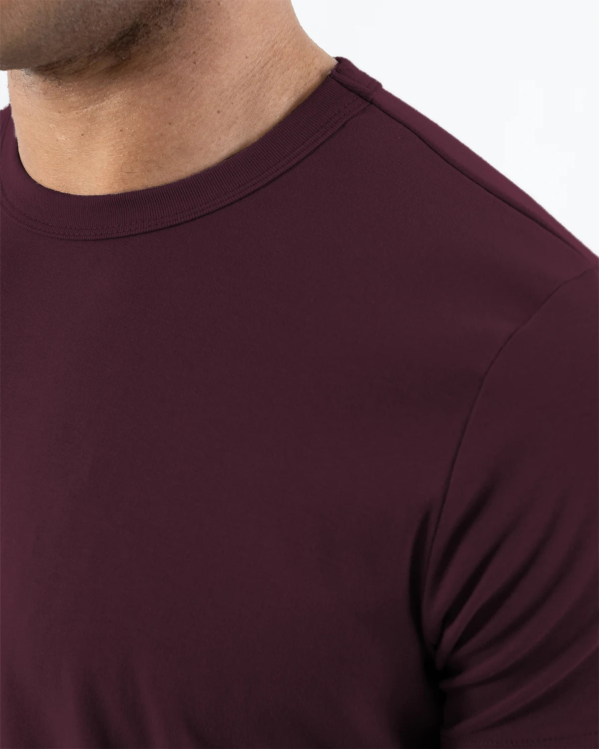 Close view of the Plum crew collar and shoulder seam